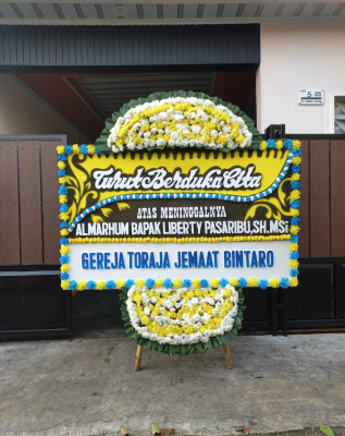 Papan Bunga Duka di Sosa
